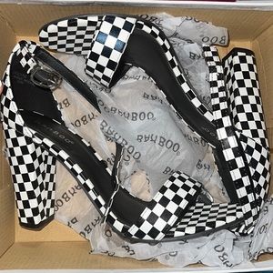 WHITE AND BLACK HEELS